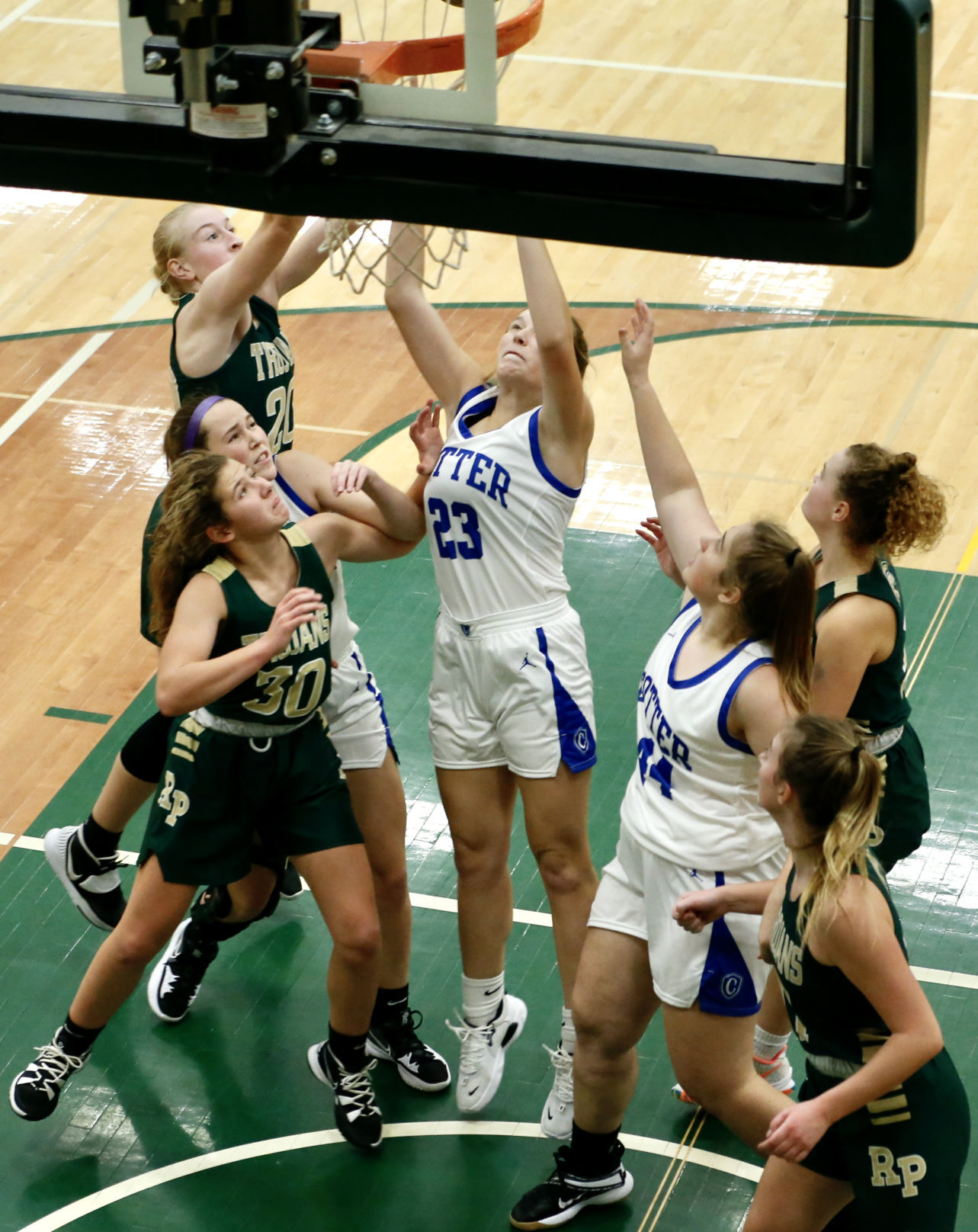 R-P and Cotter battle for a rebound